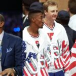 Isiah Thomas (L), Michael Jordan and Scottie Pippen (R)