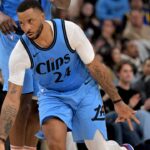 Los Angeles Clippers guard Norman Powell (24) celebrates after a 3-point basket in the second half against the Golden State Warriors at Intuit Dome.