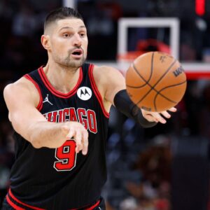 Chicago Bulls center Nikola Vucevic (9) passes the ball against the Indiana Pacers during the second half at United Center.