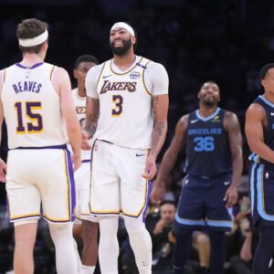 Los Angeles Lakers forward Anthony Davis (3) and guard Austin Reaves (15) react in the first hqlf against the Memphis Grizzlies at Crypto.com Arena.