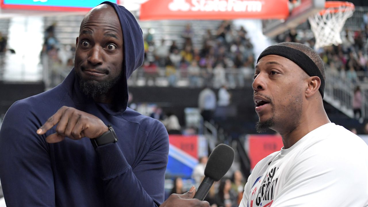 Feb 16, 2018; Los Angeles, CA, USA; Former NBA player Kevin Garnett (left) interviews former NBA player Paul Pierce during the NBA All-Star Celebrity Game at the Los Angeles Convention Center. Mandatory Credit: Kirby Lee-Imagn Images
