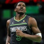 Minnesota Timberwolves guard Anthony Edwards (5) runs up court during the second half of an NBA Cup game against the LA Clippers at Target Center