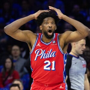 Philadelphia 76ers center Joel Embiid (21) reacts to a play against the Indiana Pacers during the first quarter at Wells Fargo Center.