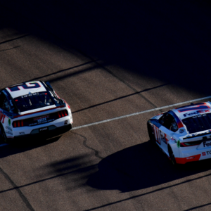 NASCAR Cup Series driver Austin Cindric (2) leads driver Denny Hamlin (11) during the Cup Series championship race at Phoenix Raceway.