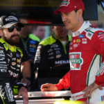 NASCAR Cup Series driver Ryan Blaney (L) talks with NASCAR Cup Series driver Joey Logano (R) during practice for the Straight Talk Wireless 400 at Homestead-Miami Speedway.