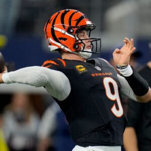 Cincinnati Bengals quarterback Joe Burrow (9) practices his throw before Dallas Cowboys during Monday Night Football at AT&T Stadium in Arlington, Texas on Monday, December 9, 2024.