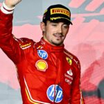 Second place winner Monaco's Formula One driver Charles Leclerc of Ferrari celebrates on the podium after after the Formula 1 Grand Prix of Qatar