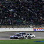 May 5, 2024; Kansas City, Kansas, USA; NASCAR Cup Series drivers Kyle Larson (5) and Chris Buescher (17) battle for the lead on the final lap off the Advent Health 400 at the Kansas Speedway. Mandatory Credit: Reese Strickland-Imagn Images