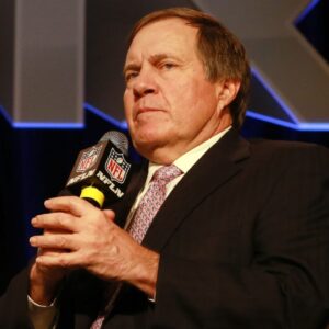 2015: Patriots head coach Bill Belichick answers questions during a press conference with the Vince Lombardi trophy as the New England Patriots and Seattle Seahawks prepare for Super Bowl XLIX.