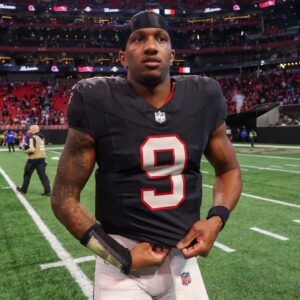 Atlanta Falcons quarterback Michael Penix Jr. (9) on the field after a victory over the New York Giants at Mercedes-Benz Stadium.