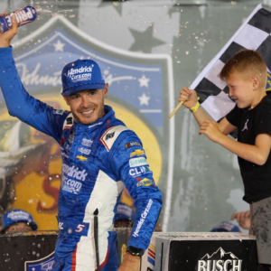 NASCAR Cup Series driver Kyle Larson (5) and his son Owen after winning the Bass Pro Shops Night Race at Bristol Motor Speedway.