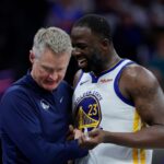Golden State Warriors forward Draymond Green (23) talks with head coach Steve Kerr during the fourth quarter against the Sacramento Kings at Golden 1 Center.