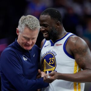 Golden State Warriors forward Draymond Green (23) talks with head coach Steve Kerr during the fourth quarter against the Sacramento Kings at Golden 1 Center.