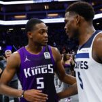 Sacramento Kings guard De'Aaron Fox (5) and Minnesota Timberwolves guard Anthony Edwards (5) meet after the game at Golden 1 Center.