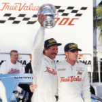 NASCAR driver Dale Earnhardt Sr and Dale Earnhardt Jr in victory lane after Earnhardt Sr. won the IROC race at Daytona International Speedway.