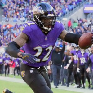 Baltimore Ravens running back Derrick Henry (22) scores a third quarter touchdown against the Denver Broncos at M&T Bank Stadium.