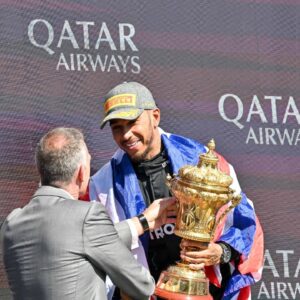 Lewis Hamilton celebrates as he wins the Formula 1 Qatar Airways British Grand Prix at Silverstone, Towcester, Northamptonshire, UK