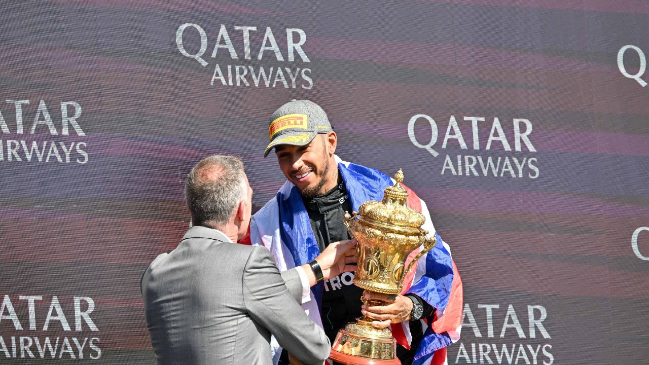 Lewis Hamilton celebrates as he wins the Formula 1 Qatar Airways British Grand Prix at Silverstone, Towcester, Northamptonshire, UK