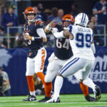 Dec 9, 2024; Arlington, Texas, USA; Cincinnati Bengals quarterback Joe Burrow (9) throws during the first quarter against the Dallas Cowboys at AT&T Stadium.