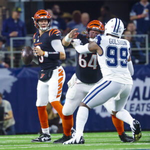 Dec 9, 2024; Arlington, Texas, USA; Cincinnati Bengals quarterback Joe Burrow (9) throws during the first quarter against the Dallas Cowboys at AT&T Stadium.