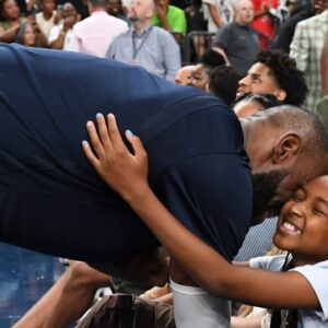 USA forward Lebron James (6) greets his daughter Zhuri James after the third quarter against Canada for the USA Basketball Showcase at T-Mobile Arena.