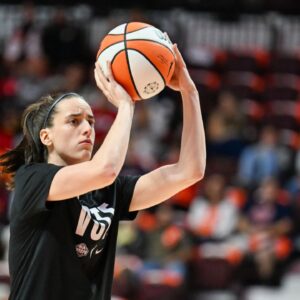 Indiana Fever guard Caitlin Clark (22) warms up before game one of the first round of the 2024 WNBA Playoffs at Mohegan Sun Arena.