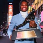 Colorado Buffaloes wide receiver/cornerback Travis Hunter after winning the 2024 Heisman Trophy.