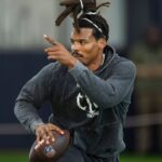 Former Auburn quarterback and NFL MVP Cam Newton runs a drill during Auburn Tigers Pro Day at Woltosz Football Performance Center in Auburn, Ala., on Tuesday, March 21, 2023.