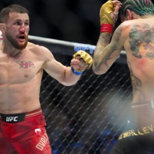 Sean OíMalley of the United States (red gloves) fights Merab Dvalishvili of Georgia (blue gloves) during Riyadh Season Noche UFC 306 at The Sphere.