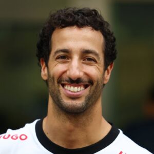 Daniel Ricciardo of Australia and Visa Cash App RB F1 Team poses with fans during previews ahead of the F1 Grand Prix of Singapore