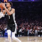 San Antonio Spurs center Victor Wembanyama (1) takes a three point shot in the first quarter against the New York Knicks at Madison Square Garden