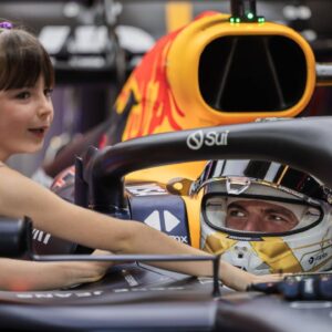 Max Verstappen of the Netherlands and Oracle Red Bull Racing and Penelope of Kelly Piquet™s daughter in the garage during Formula One Abu Dhabi Grand Prix