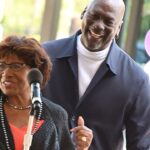 Michael Jordan and his mother Deloris Jordan talk to the crowd outside of The Michael Jordan Family Medical Clinic led by Novant Health. Both were taking part in a ribbon cutting ceremony for the new clinic opening off of Greenfield Street