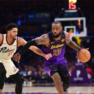 Los Angeles Lakers forward LeBron James (23) moves the ball against Detroit Pistons forward Tobias Harris (12) during the second half at Crypto.com Arena