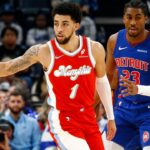 Memphis Grizzlies guard Scotty Pippen Jr. (1) dribbles the ball as Detroit Pistons guard Jaden Ivey (23) defends during the first quarter at FedExForum.