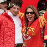 Kansas City Chiefs quarterback Patrick Mahomes (15) celebrates with his mother Randi Martin during the Kansas City Chiefs Super Bowl parade.