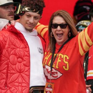Kansas City Chiefs quarterback Patrick Mahomes (15) celebrates with his mother Randi Martin during the Kansas City Chiefs Super Bowl parade.