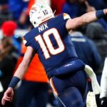 Dec 2, 2024; Denver, Colorado, USA; Denver Broncos quarterback Bo Nix (10) celebrates following a touchdown in the third quarter against the Cleveland Browns at Empower Field at Mile High.
