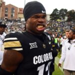 Colorado Buffaloes wide receiver Travis Hunter (12) walks off the field before the game against the Baylor Bears at Folsom Field.