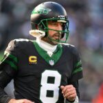 New York Jets quarterback Aaron Rodgers (8) during the first quarter against the Seattle Seahawks at MetLife Stadium.
