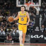Los Angeles Lakers guard Austin Reaves (15) dribbles in the second half against the San Antonio Spurs at Frost Bank Center.