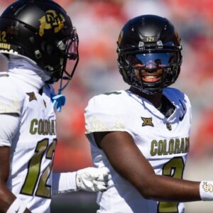 Colorado Buffaloes quarterback Shedeur Sanders (2) with wide receiver Travis Hunter (12) against the Arizona Wildcats at Arizona Stadium.