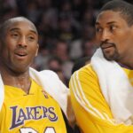 Kobe Bryant and Metta Sandiford-Artest enjoy the bench together Madatory Credit: USA Today via Imagn