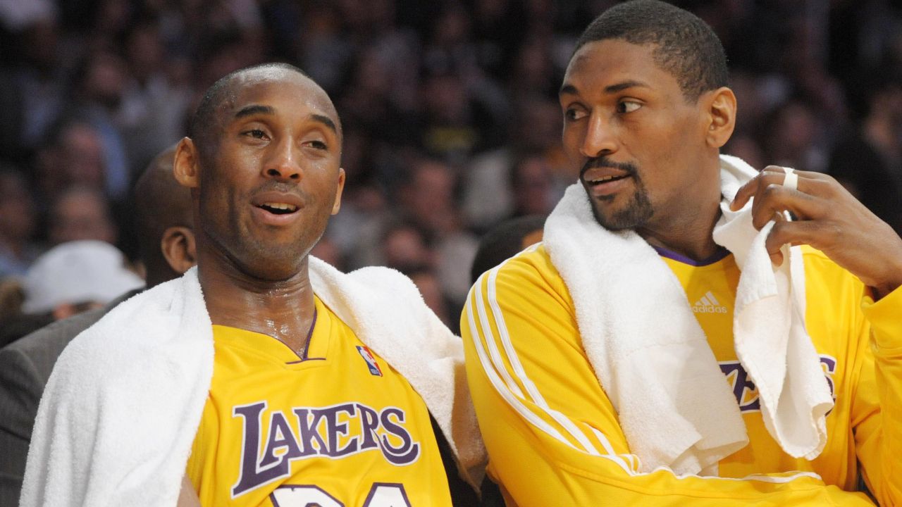 Kobe Bryant and Metta Sandiford-Artest enjoy the bench together Madatory Credit: USA Today via Imagn