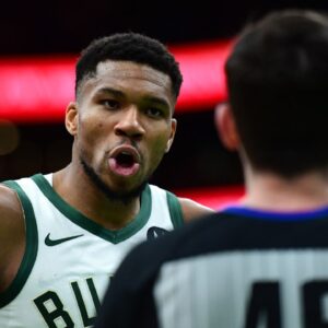 Milwaukee Bucks forward Giannis Antetokounmpo (34) has words with crew chief Ben Taylor during the second half at TD Garden.