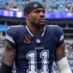 Dec 15, 2024; Charlotte, North Carolina, USA; Dallas Cowboys linebacker Micah Parsons (11) walks onto the field during the first quarter against the Carolina Panthers at Bank of America Stadium.