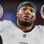 Baltimore Ravens running back Derrick Henry (22) warms up before a game against the Tampa Bay Buccaneers at Raymond James Stadium.