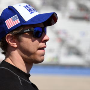 NASCAR Cup Series driver Brad Keselowski (2) waits beside his car before qualifying for the Ally 400 at Nashville Superspeedway.