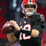 Atlanta Falcons quarterback Kirk Cousins (18) prepares for a game against the New York Giants at Mercedes-Benz Stadium.