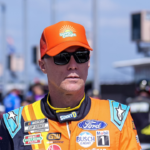 Kevin Harvick walks to his car for Cup practice at Darlington Raceway.